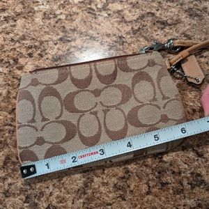 Brown coach signature wristlet